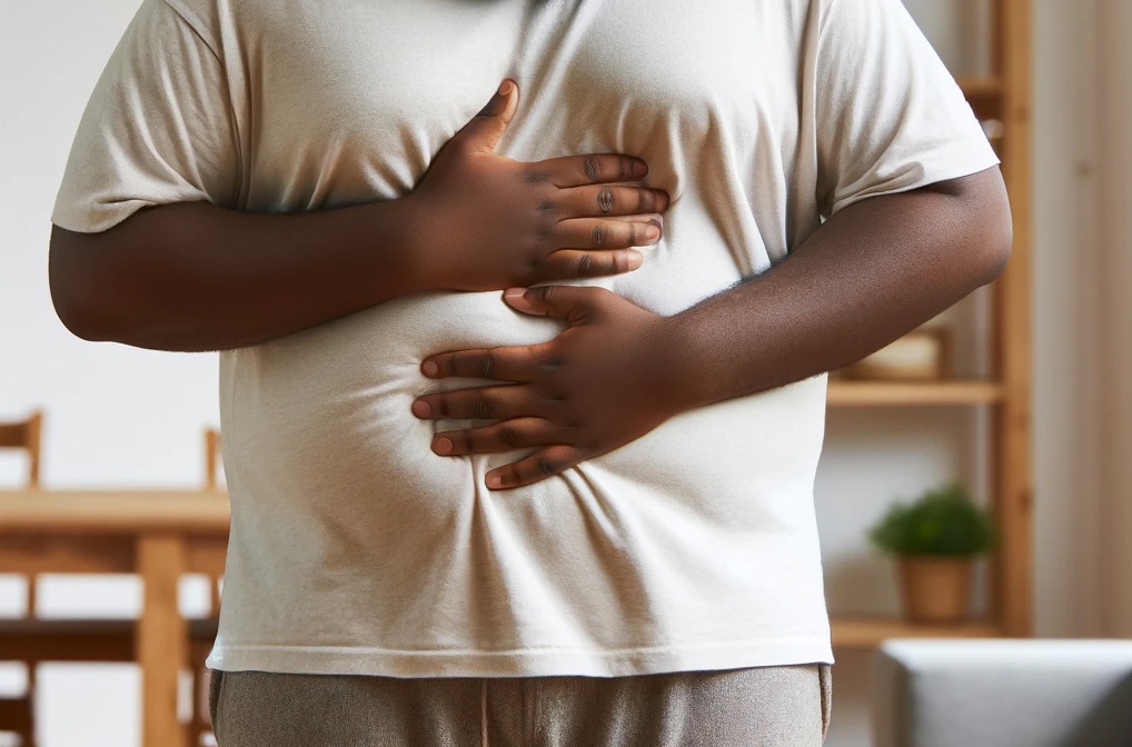 black man with stomach pain, potentially gastroparesis, one of the conditions mentioned in the wegovy lawsuit