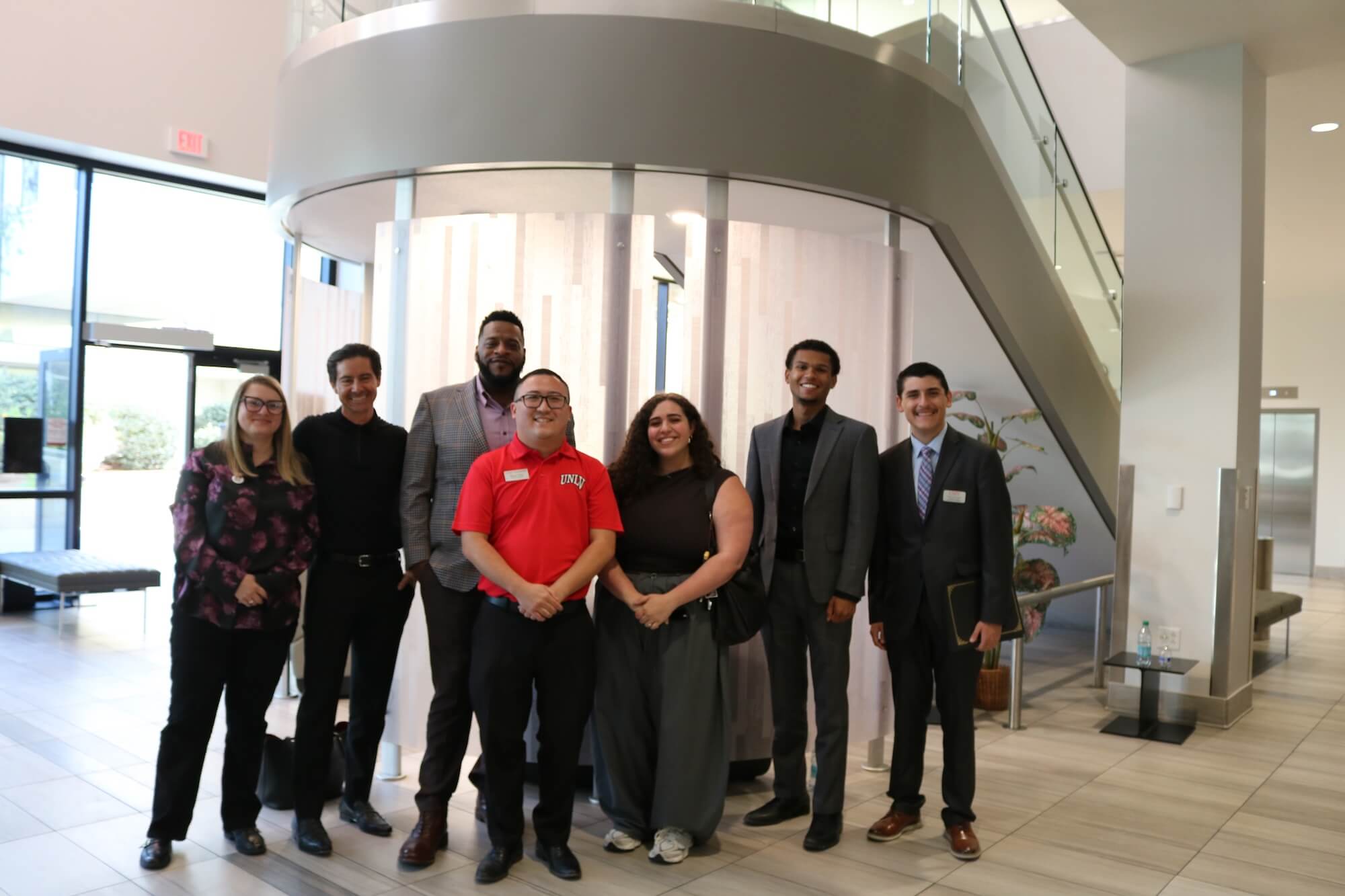 Panelists and UNLV Pre-Law representatives standing together at the UNLV Undergraduate Pre-Law Banquet and Career Fair